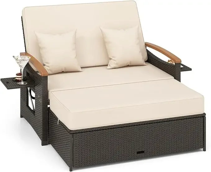 Outdoor willow sofa bed, folding panel, storage stool with comfortable cushion, sun lounge chair on backyard porch